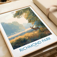 Framed Richmond Park travel art print with deer in sunlit landscape, unwrapped on table