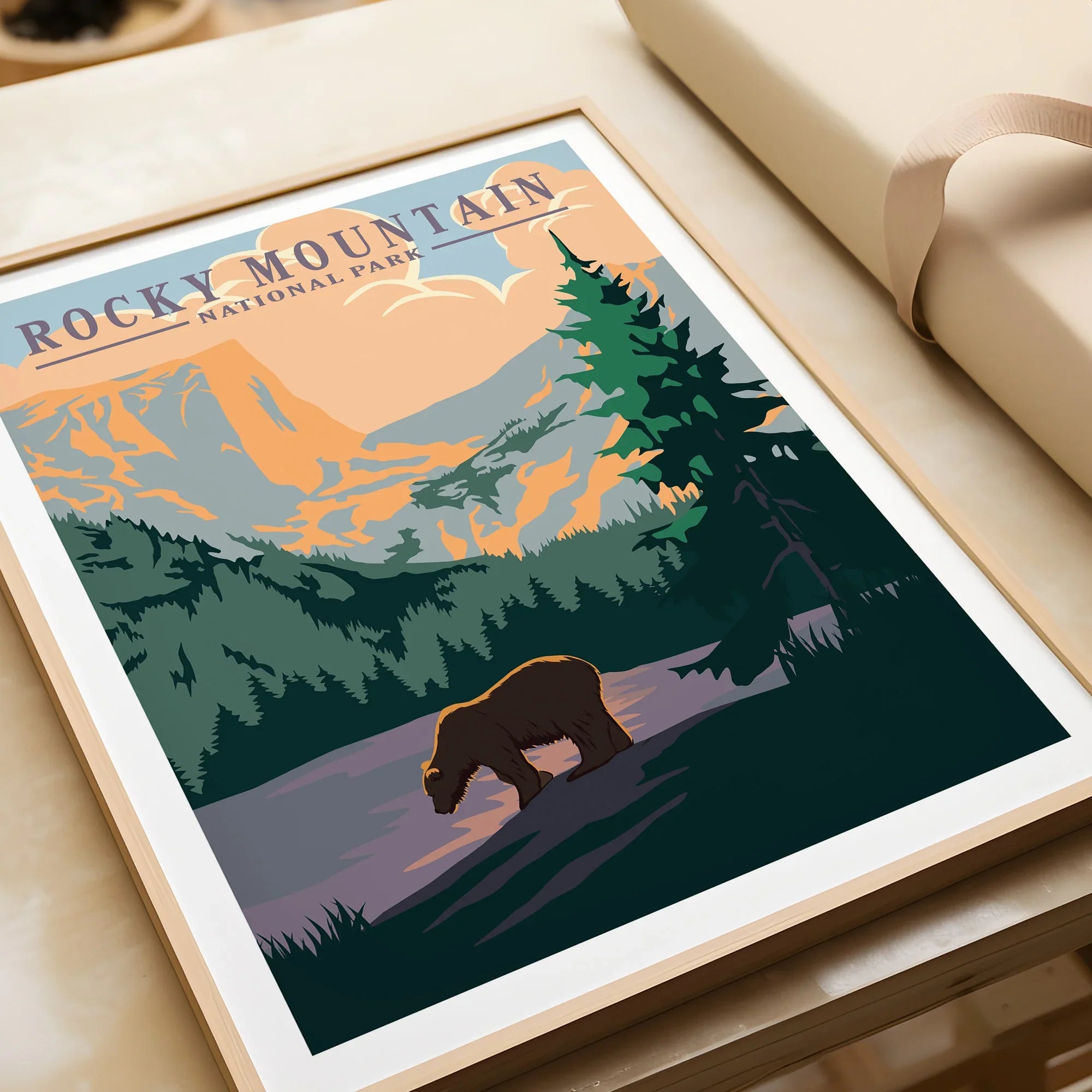 Framed Rocky Mountain National Park art print with bear and forest landscape