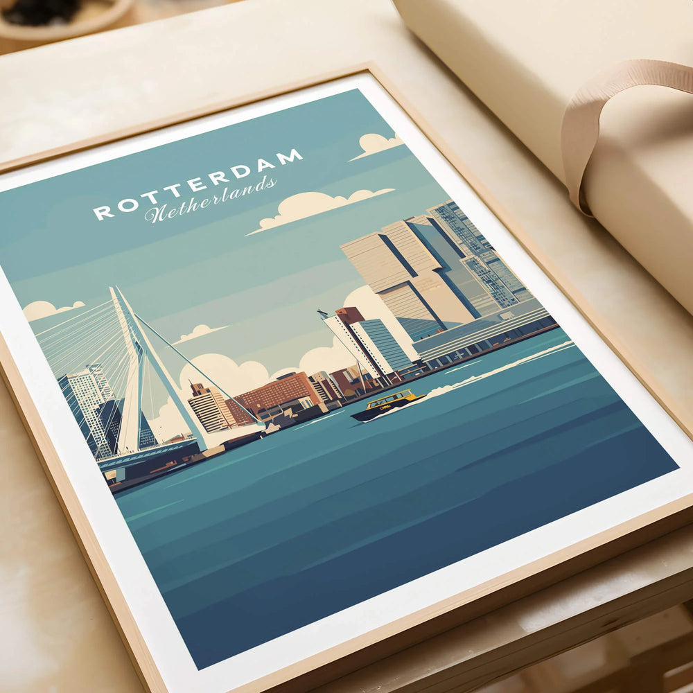 Framed Rotterdam Netherlands city skyline art print, unwrapped with gift paper nearby