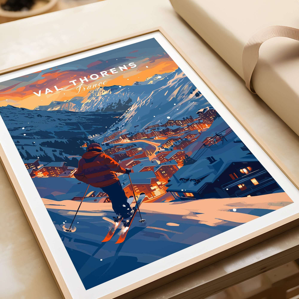 Val Thorens Ski Poster featuring a skier overlooking the stunning French Alps at sunset.