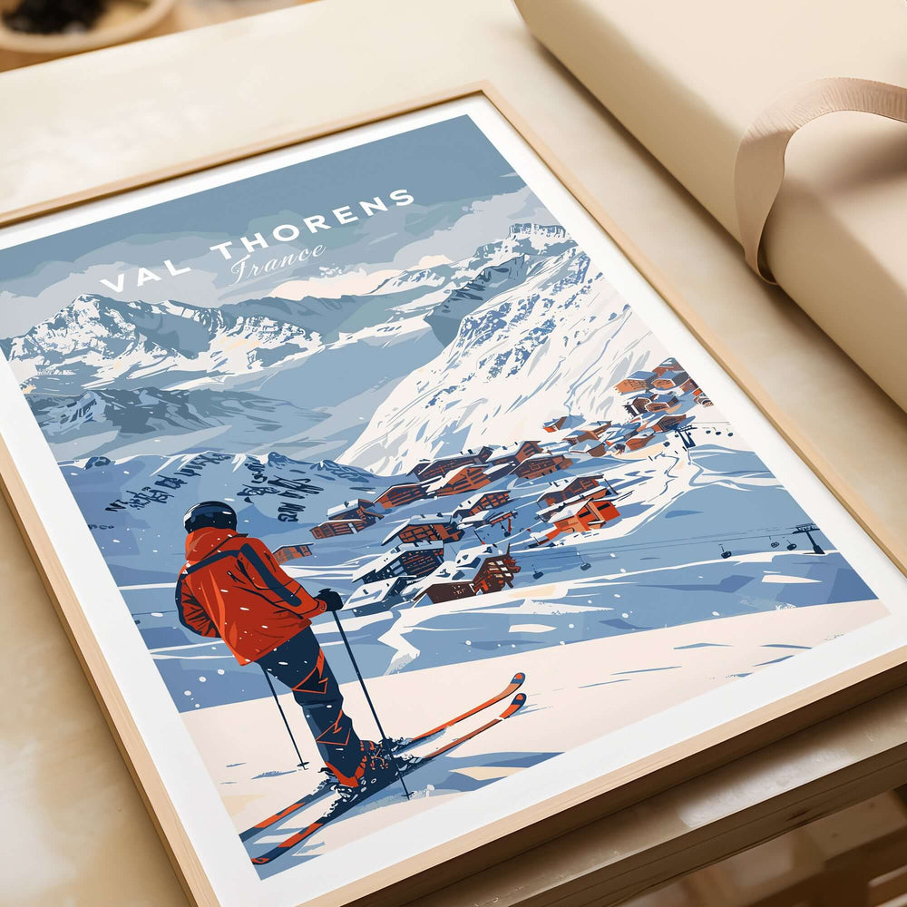 Val Thorens Wall Art Print featuring a skier overlooking the snowy landscape of Val Thorens, France.