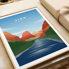 Framed Zion National Park art print with river, red rock cliffs, and blue sky