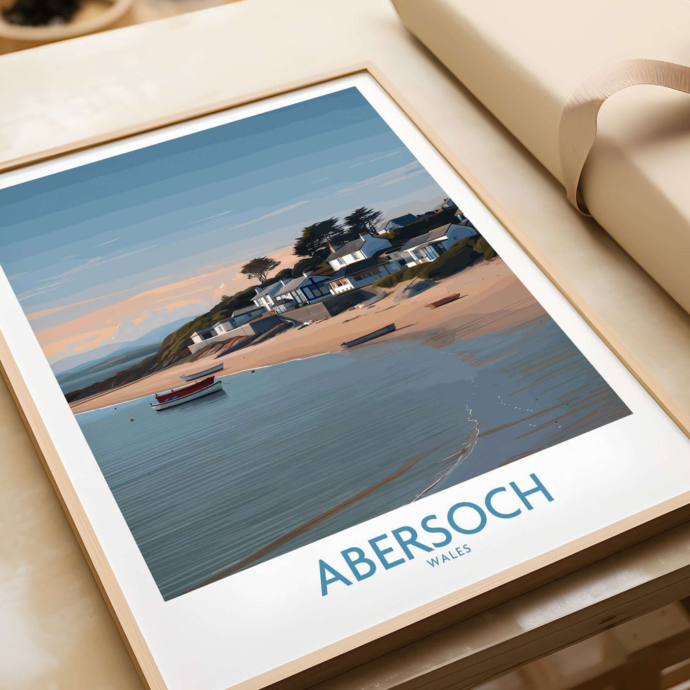 Abersoch Wales Sunset Beach Art Print | Coastal Cottages Wall Decor framed on a table showcasing coastal scenery.