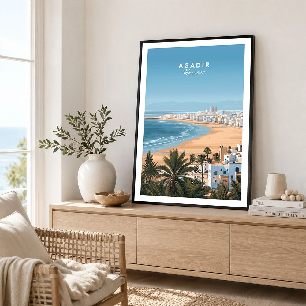 Agadir Morocco Poster – Travel Print in a black frame displayed on an oak sideboard in a bright coastal living room