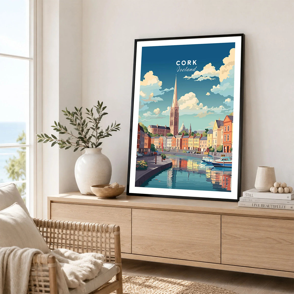 Cork City Ireland Print in a black frame displayed on an oak sideboard in a bright coastal living room