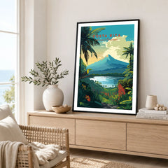 Costa Rica Print in a black frame displayed on an oak sideboard in a bright coastal living room