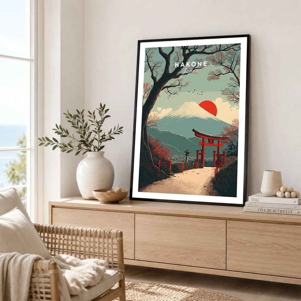 Hakone Japan Torii Gate Mount Fuji Print - Iconic Japanese Poster in a black frame displayed on an oak sideboard in a bright coastal living room