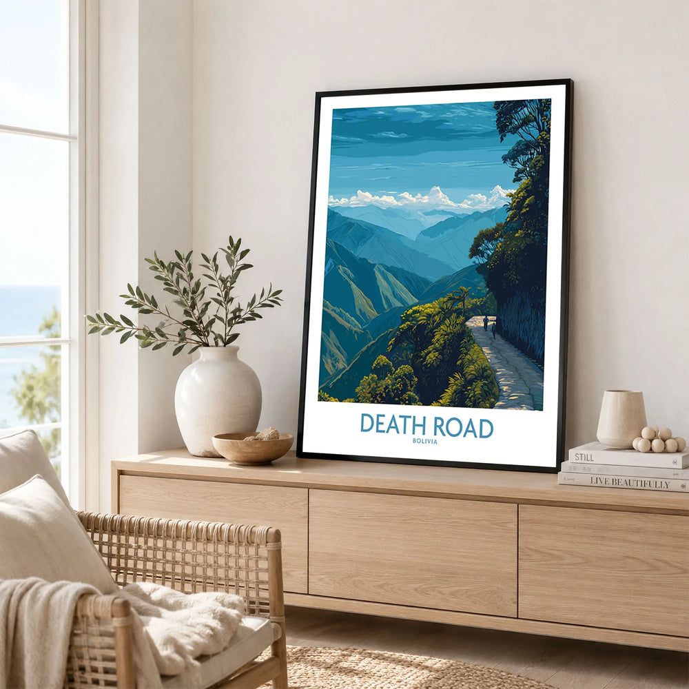 Death Road Bolivia Hiking Trail Art Print | Camino de la Muerte Poster in a black frame displayed on an oak sideboard in a bright coastal living room