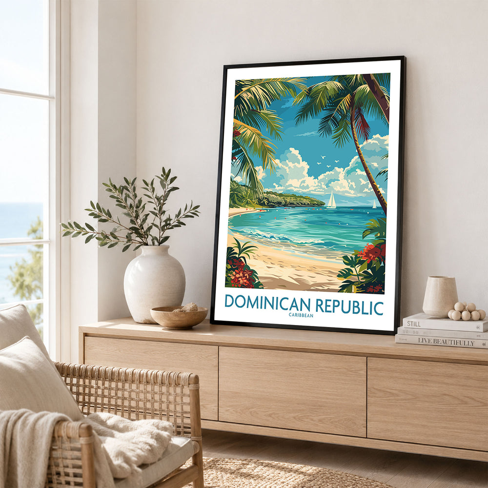 Dominican Republic Poster in a black frame displayed on an oak sideboard in a bright coastal living room
