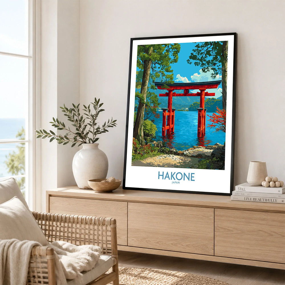 Hakone Japan Iconic Torii Print - Japanese Scenic Landscape Decor in a black frame displayed on an oak sideboard in a bright coastal living room