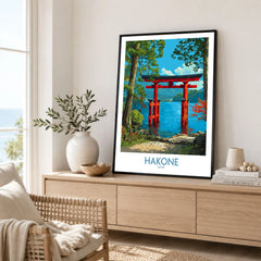 Hakone Japan Iconic Torii Print - Japanese Scenic Landscape Decor in a black frame displayed on an oak sideboard in a bright coastal living room
