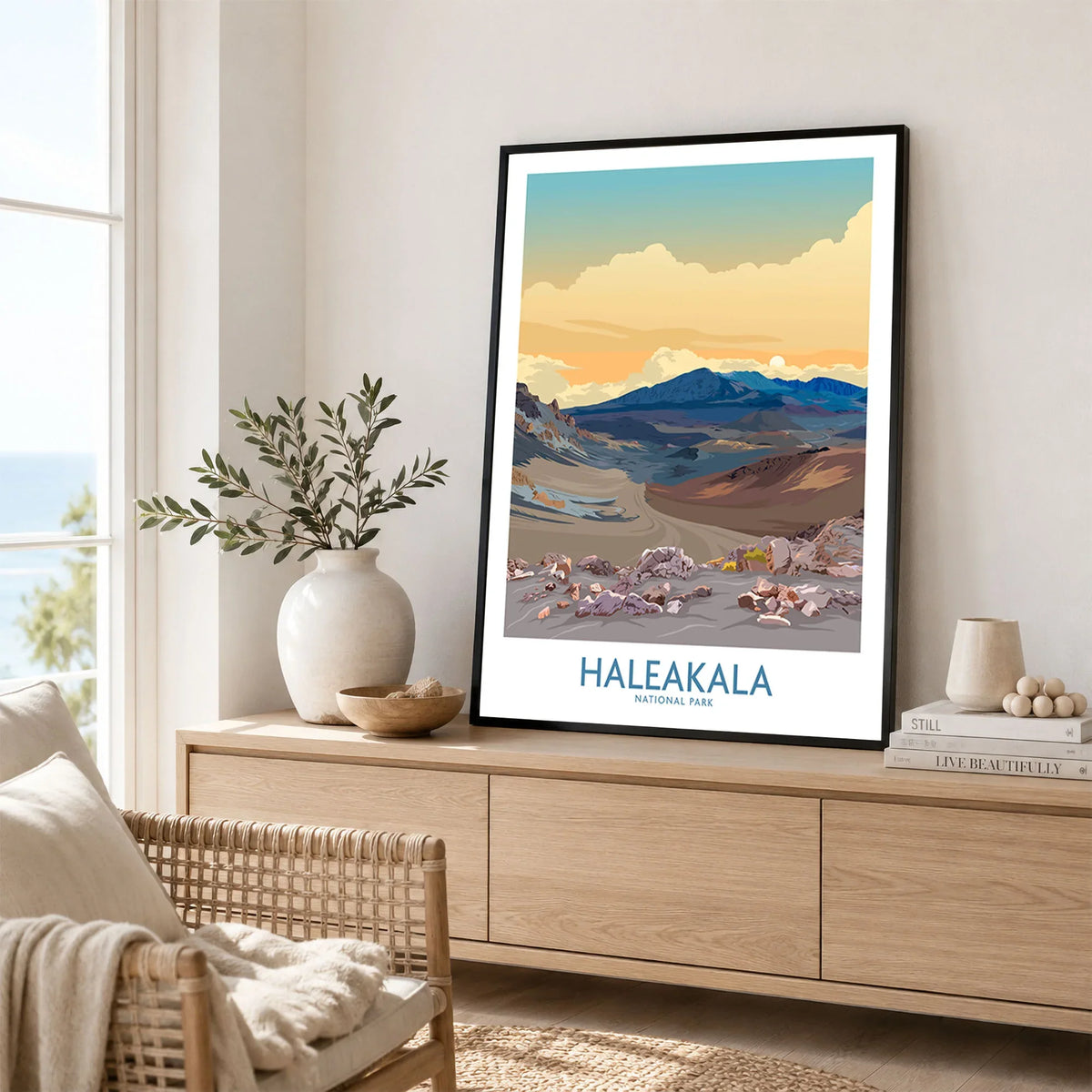 Haleakalā National Park Print, Hawaiian Volcano Poster, Sunset Wall Decor in a black frame displayed on an oak sideboard in a bright coastal living room