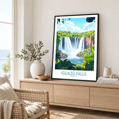 Iguazu Falls Travel Poster in a black frame displayed on an oak sideboard in a bright coastal living room