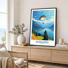 Interlaken Wall Art Print in a black frame displayed on an oak sideboard in a bright coastal living room