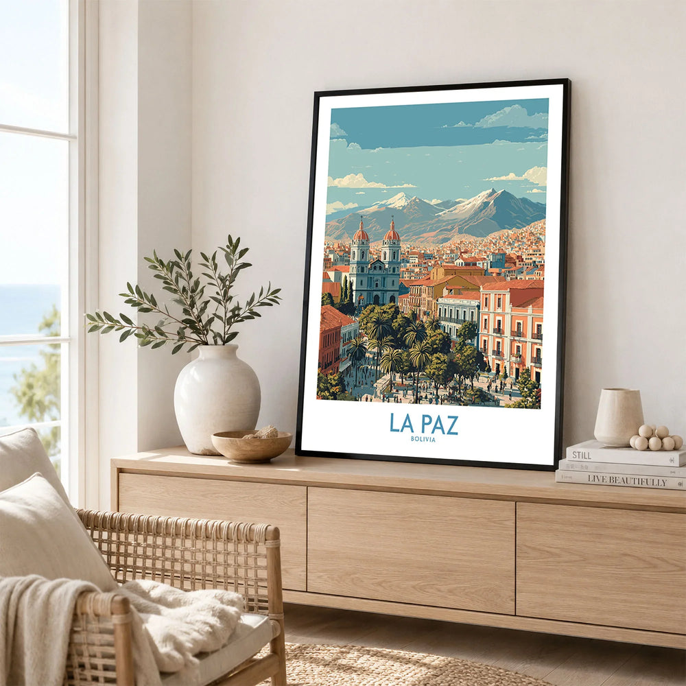 La Paz Bolivia Wall Art Poster - Bolivian Capital Travel Decor in a black frame displayed on an oak sideboard in a bright coastal living room