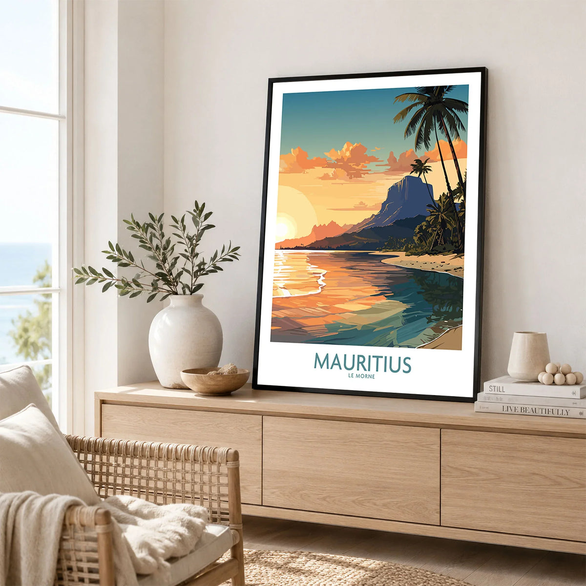 Le Morne Mauritius Wall Art in a black frame displayed on an oak sideboard in a bright coastal living room