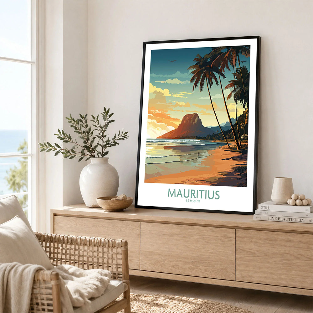 Mauritius Le Morne Print in a black frame displayed on an oak sideboard in a bright coastal living room