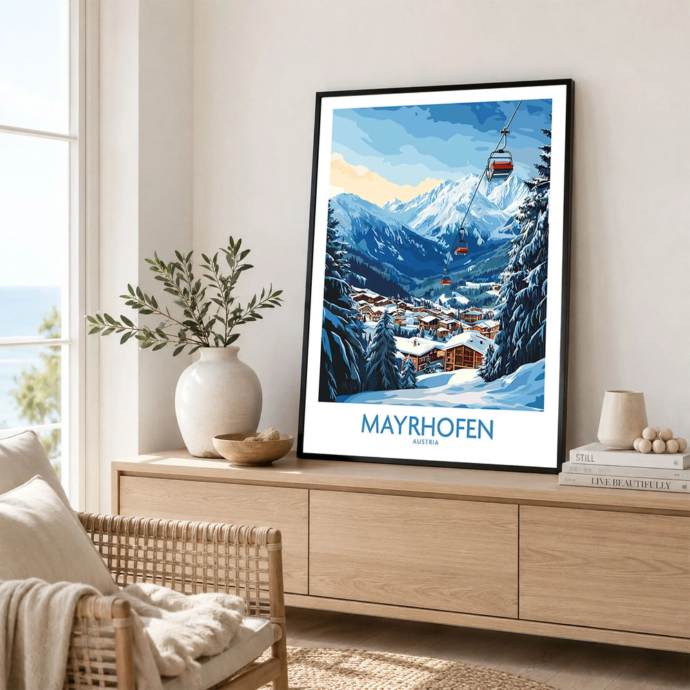 Mayrhofen Ski Poster in a black frame displayed on an oak sideboard in a bright coastal living room