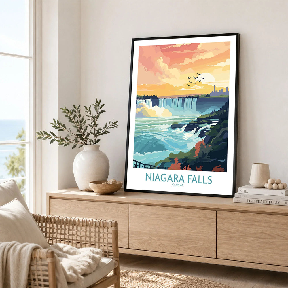 Niagara Falls Poster in a black frame displayed on an oak sideboard in a bright coastal living room