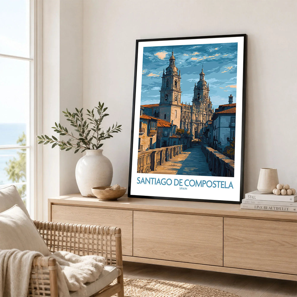 Santiago de Compostela Art Print | Galician Travel Poster in a black frame displayed on an oak sideboard in a bright coastal living room