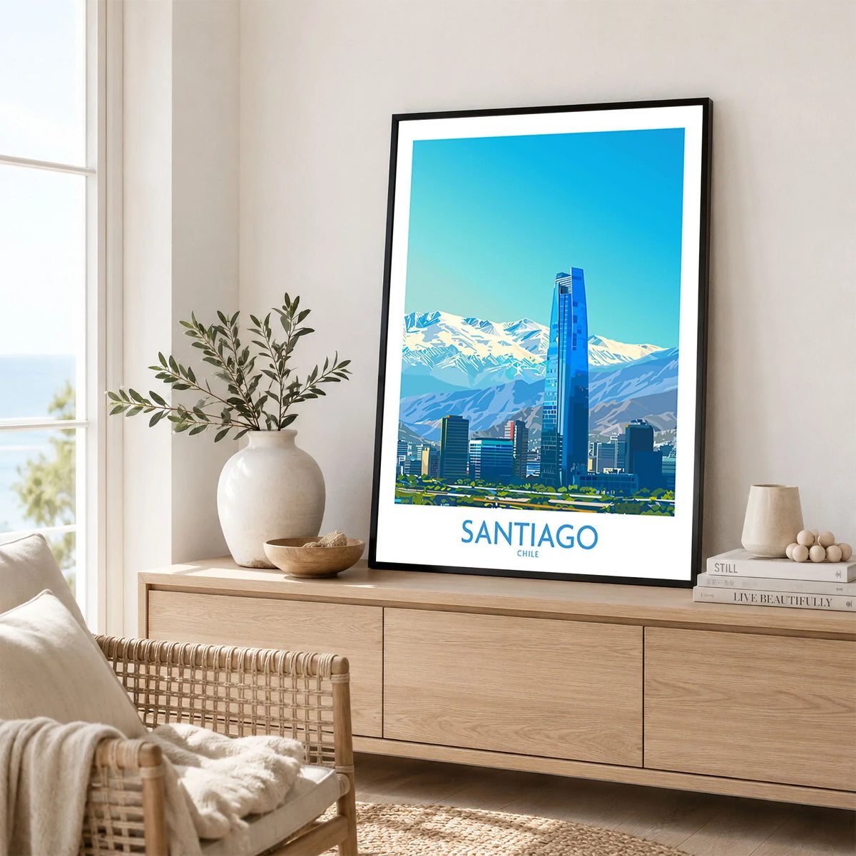 Santiago Wall Art Print - Chile in a black frame displayed on an oak sideboard in a bright coastal living room