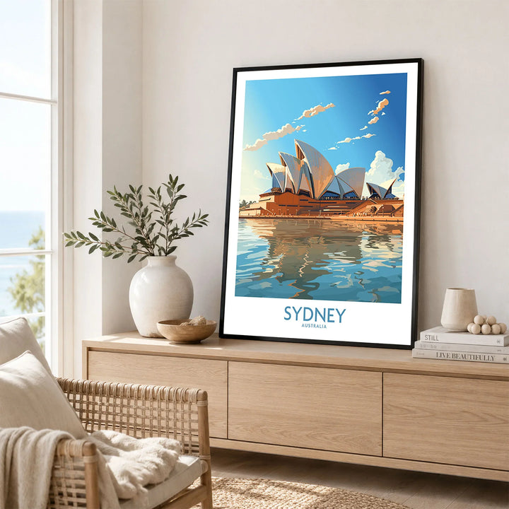 Sydney Print in a black frame displayed on an oak sideboard in a bright coastal living room