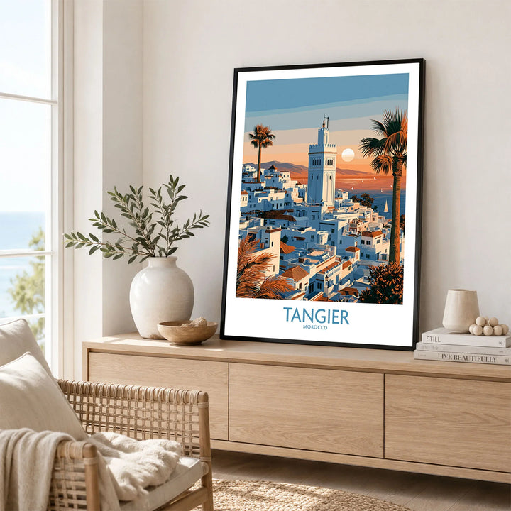 Tangier Morocco Sailboats and Rooftops Wall Art — Tangier medina rooftops and a minaret above a bay dotted with sails, shown as framed artwork living room lifestyle setting