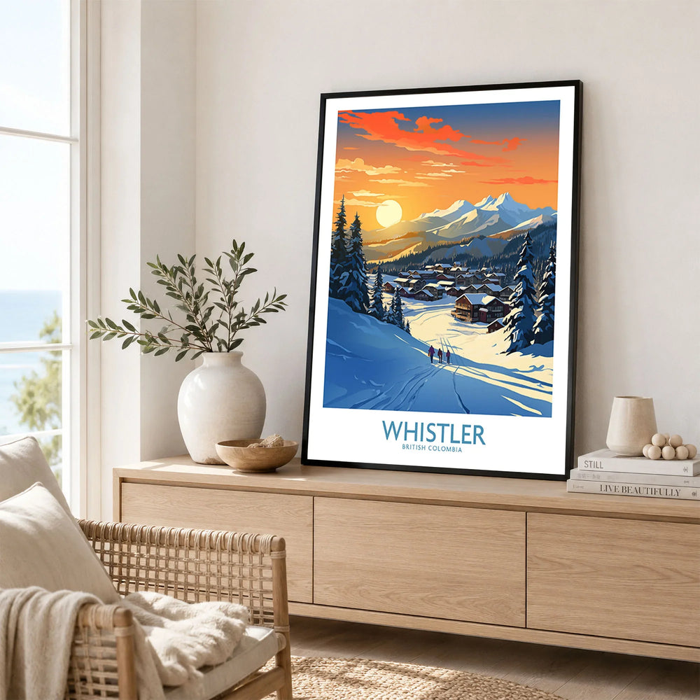 Whistler Wall Art Ski Poster in a black frame displayed on an oak sideboard in a bright coastal living room