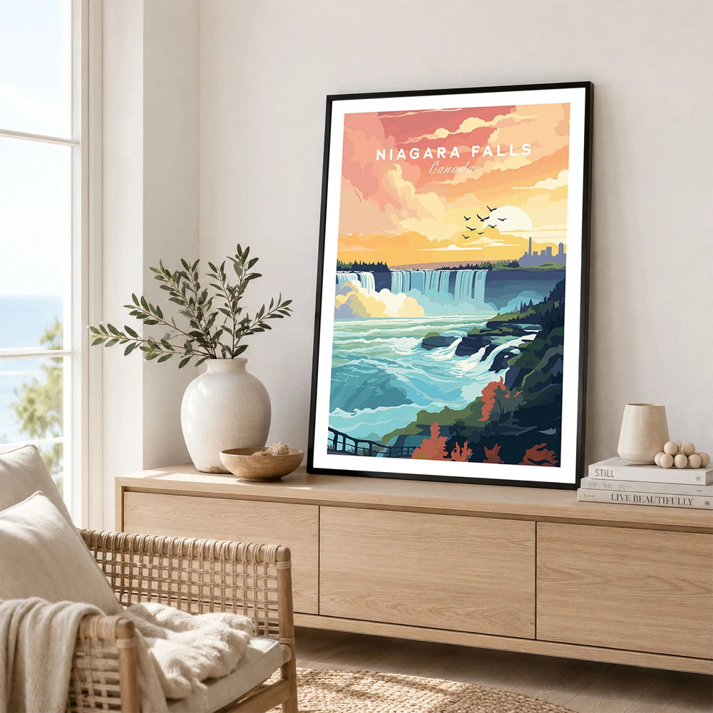 Niagara Falls Print in a black frame displayed on an oak sideboard in a bright coastal living room