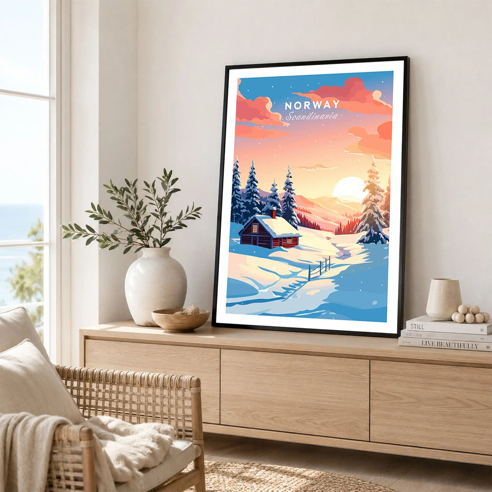 Norway Art Print in a black frame displayed on an oak sideboard in a bright coastal living room