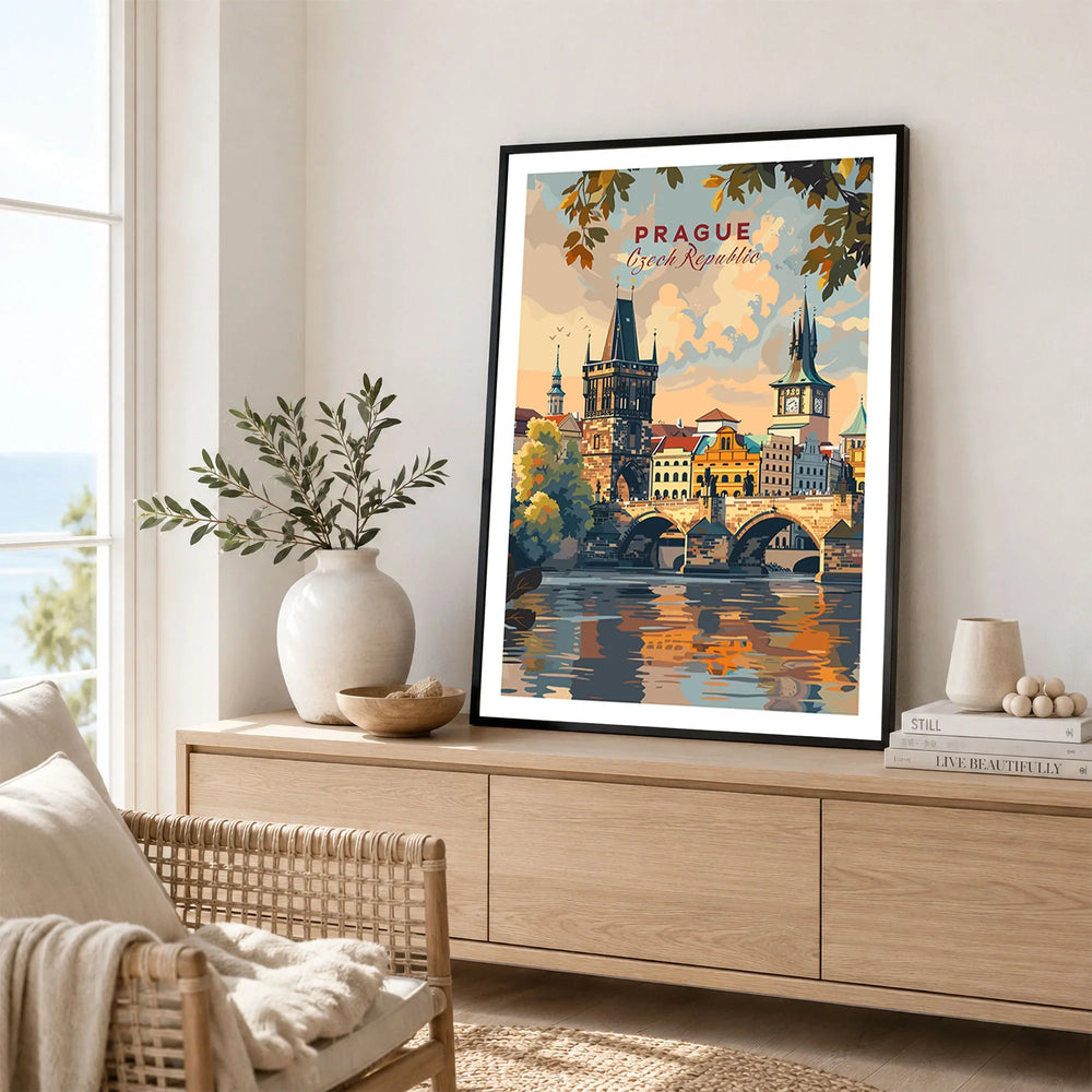 Prague Wall Art in a black frame displayed on an oak sideboard in a bright coastal living room