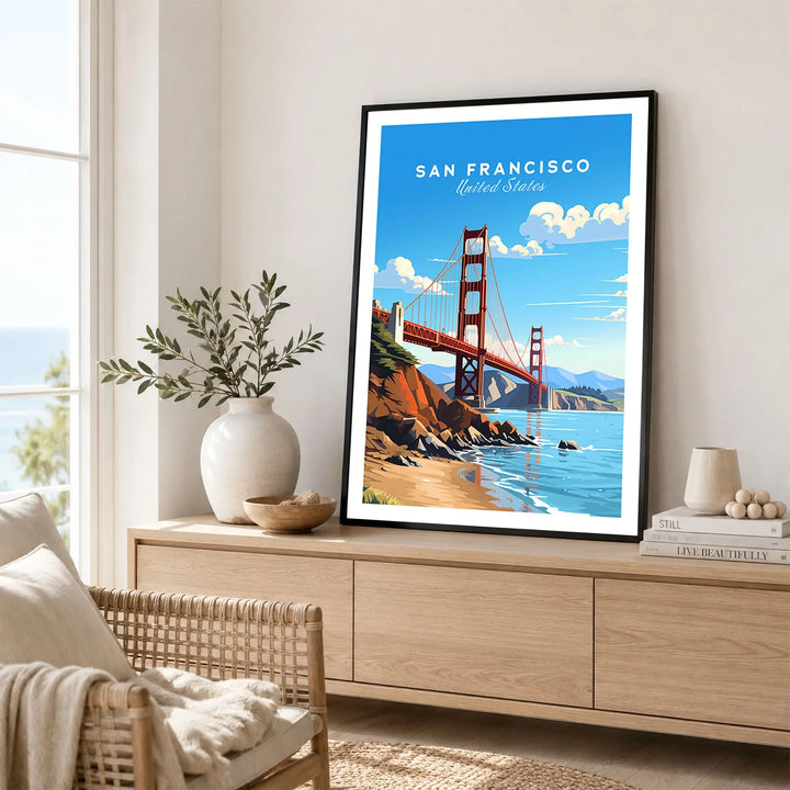 San Francisco Print in a black frame displayed on an oak sideboard in a bright coastal living room