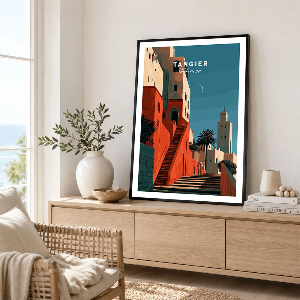 Tangier Morocco Kasbah Steps Travel Poster — coral kasbah steps climbing towards a minaret under a crescent moon, shown as framed artwork living room lifestyle setting