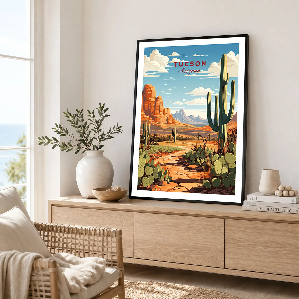 Tucson Arizona Print in a black frame displayed on an oak sideboard in a bright coastal living room