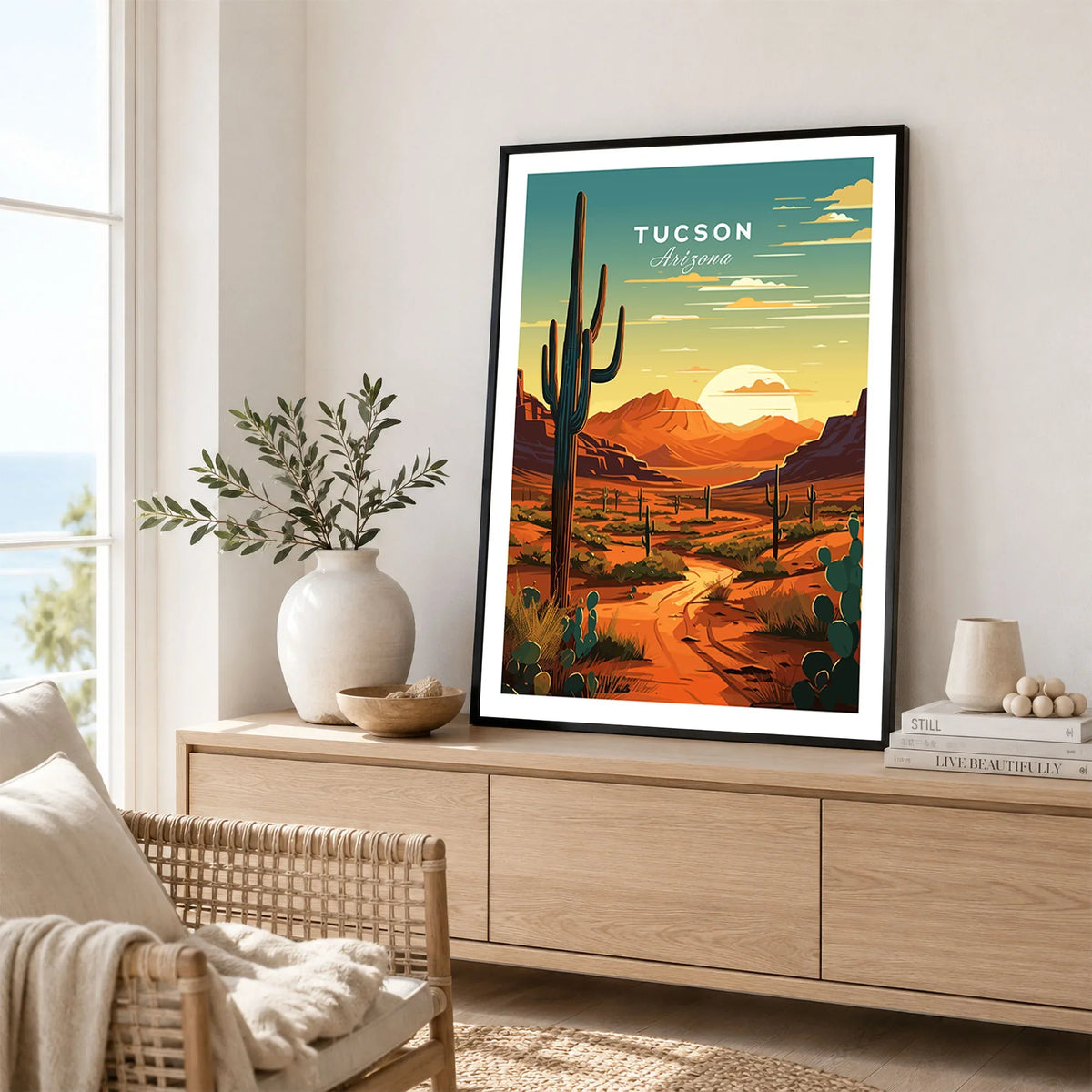 Tucson Arizona Poster in a black frame displayed on an oak sideboard in a bright coastal living room