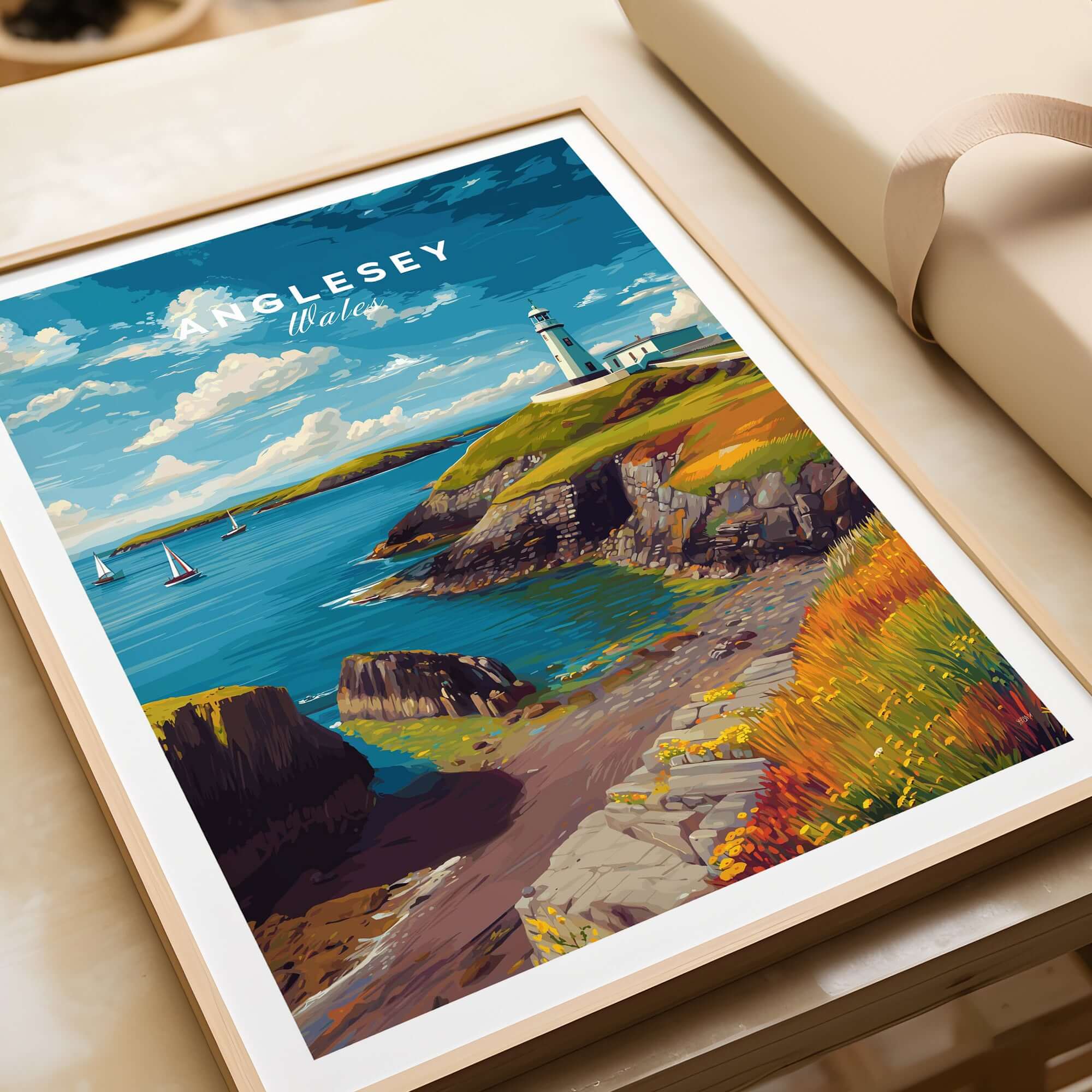 Anglesey Wales Sailboats & Lighthouse Print - Nautical Coastal Wall Art showcasing a vibrant coastal scene with a lighthouse.
