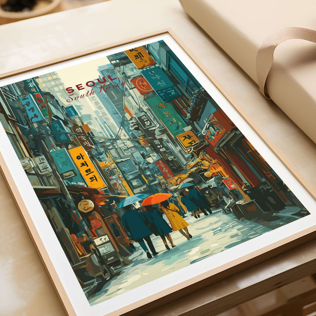 Seoul Print featuring a busy street scene in South Korea with vibrant signs and people under umbrellas.