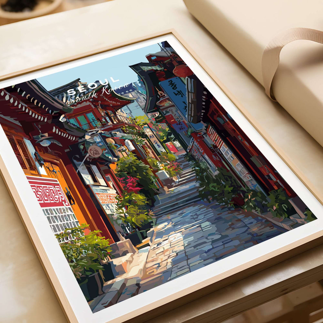 Framed wall art print of a vibrant street in Seoul, South Korea, showcasing traditional architecture and cultural charm.
