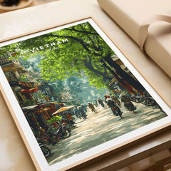 Vietnam Wall Art Poster showcasing a vibrant street scene in Vietnam with motorbikes and lush greenery.