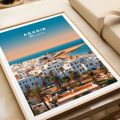 Agadir Travel Poster – City Skyline in a natural wood frame beside wrapped gift packaging, close-up detail