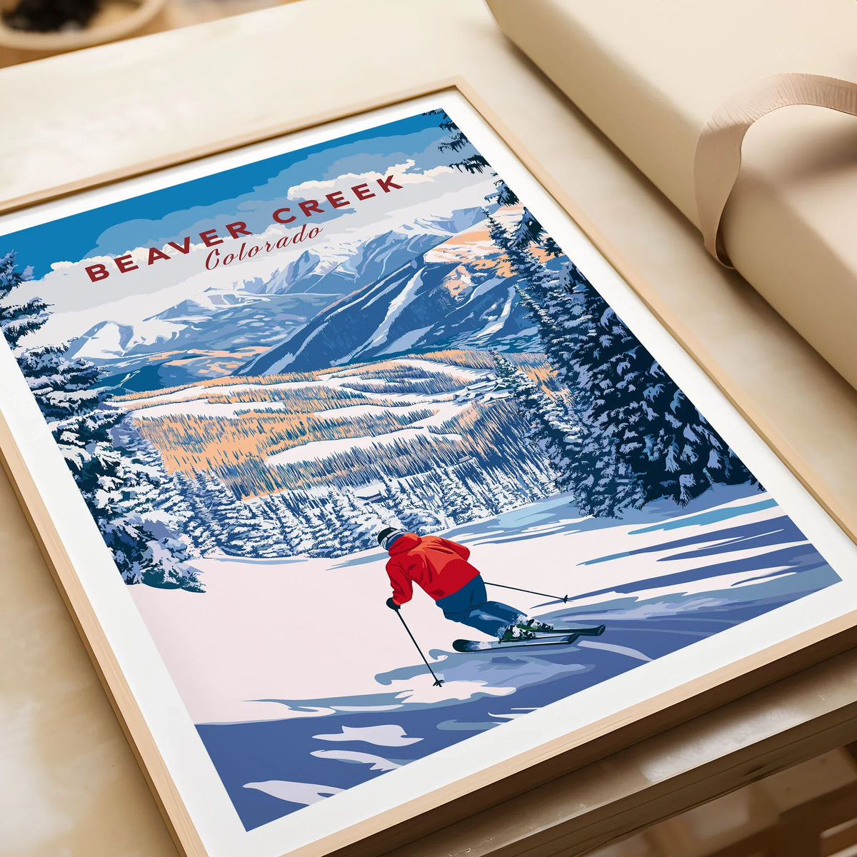 Beaver Creek Colorado Downhill Skier Poster - Winter Sports Wall Art in a natural wood frame beside wrapped gift packaging, close-up detail