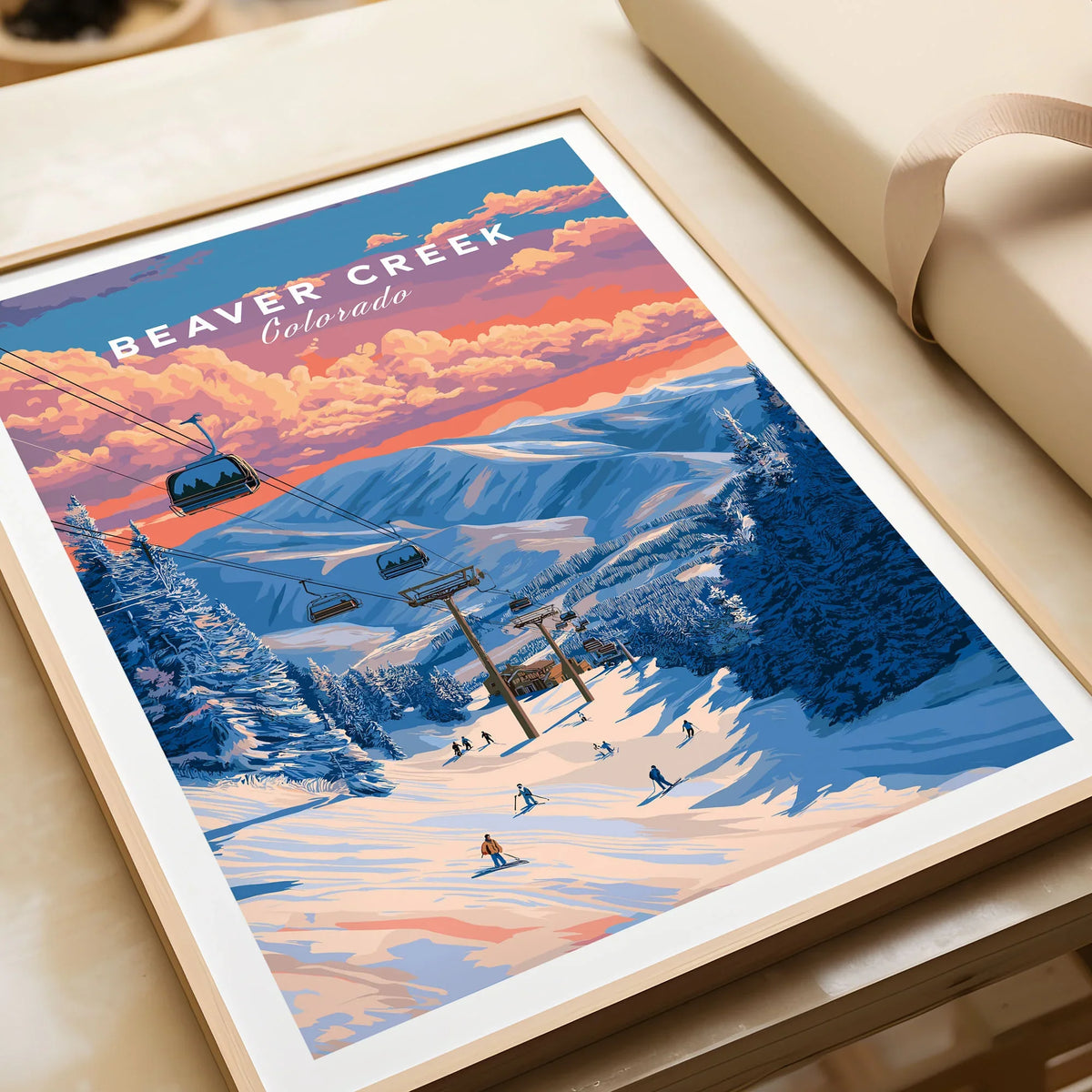 Beaver Creek Colorado Ski Lift Sunset Print - Mountain Gondola Wall Art in a natural wood frame beside wrapped gift packaging, close-up detail