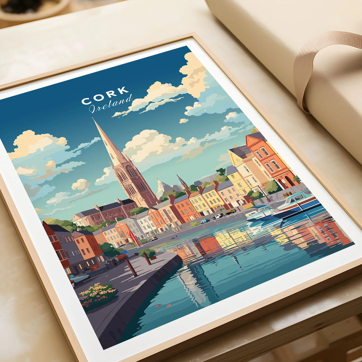 Cork City Ireland Print in a natural wood frame beside wrapped gift packaging, close-up detail