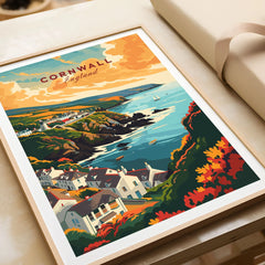Cornwall Travel Print in a natural wood frame beside wrapped gift packaging, close-up detail
