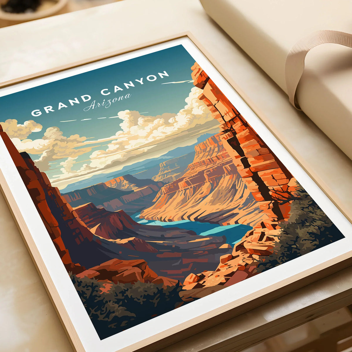 Grand Canyon Poster in a natural wood frame beside wrapped gift packaging, close-up detail