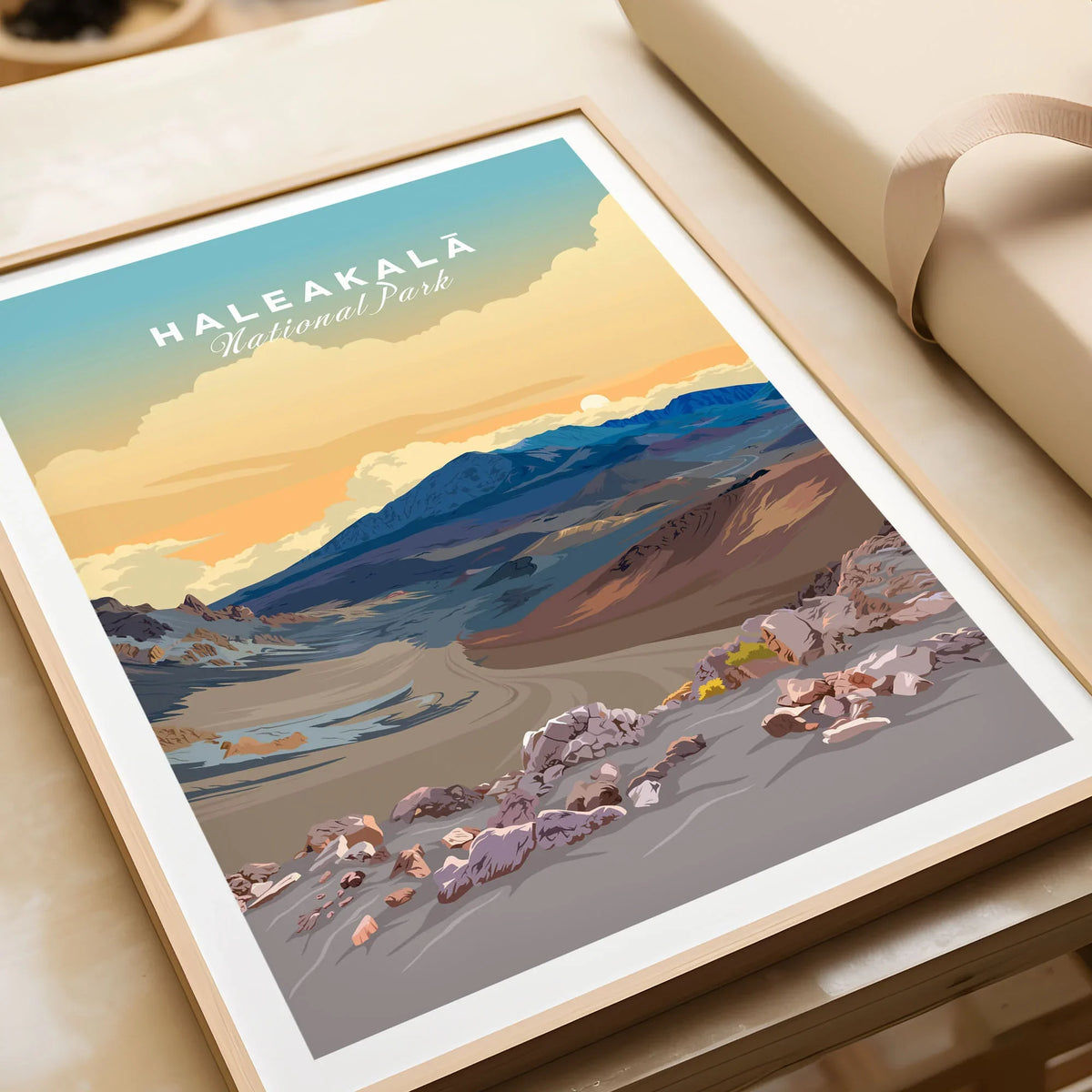 Haleakalā Volcano Poster, Maui Hawaii Travel Print, National Park Wall Art in a natural wood frame beside wrapped gift packaging, close-up detail