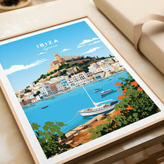 Ibiza Print in a natural wood frame beside wrapped gift packaging, close-up detail