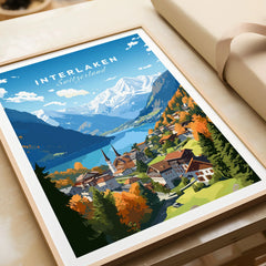 Interlaken Poster in a natural wood frame beside wrapped gift packaging, close-up detail