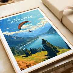 Interlaken Switzerland Poster in a natural wood frame beside wrapped gift packaging, close-up detail