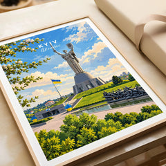Kyiv Ukraine Motherland Monument Travel Poster — the Motherland Monument under spring blossom with the Ukrainian flag flying, shown as framed art print closeup gift unwrapped natural frame